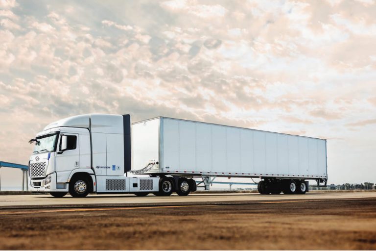 Hyundai Translead trailer on a highway at sunset