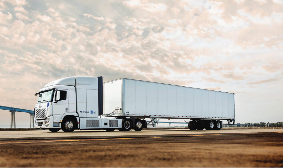 Hyundai Translead trailer on a highway at sunset